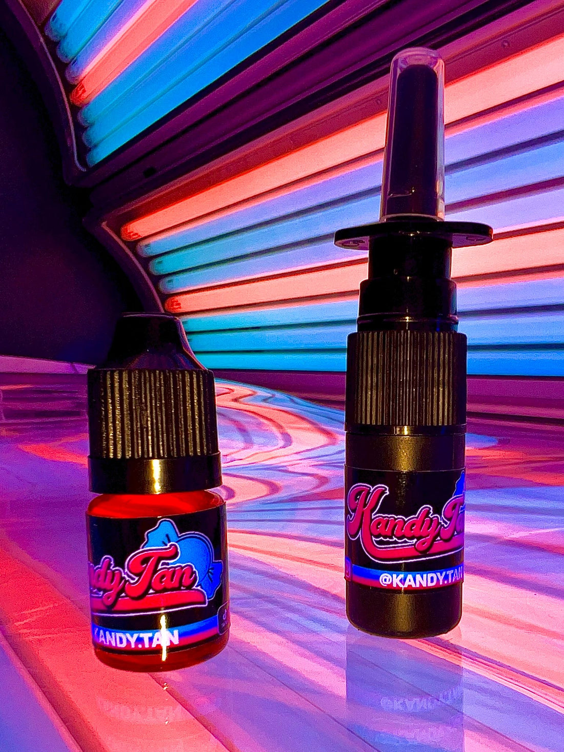 Fruit drops tanner and black bottle Nasal tanner with kandytan logo  sitting on sunbed 